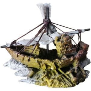 Antigua embarcación pirata con cañones y mástil, decoración temática para fiestas y eventos infantiles.