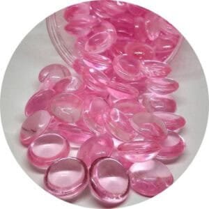 Botones de plástico rosa transparentes para manualidades y decoraciones.