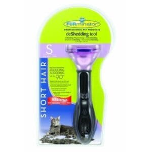 Cortador de pelo para mascotas en packaging verde y negro con imagen de gato y perro.