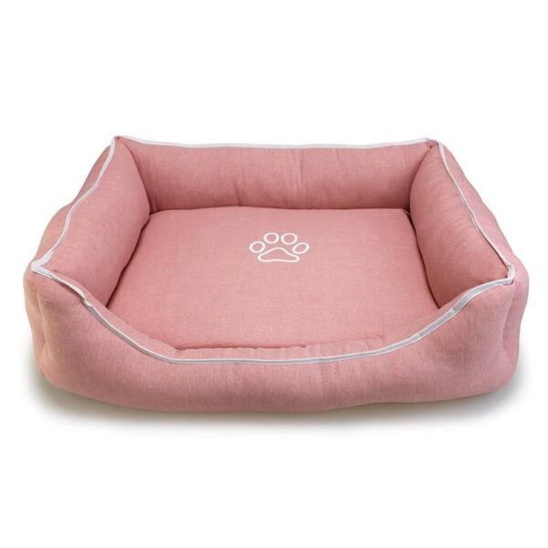 Cama para mascotas rosa con borde protector y logo de huella paw print.