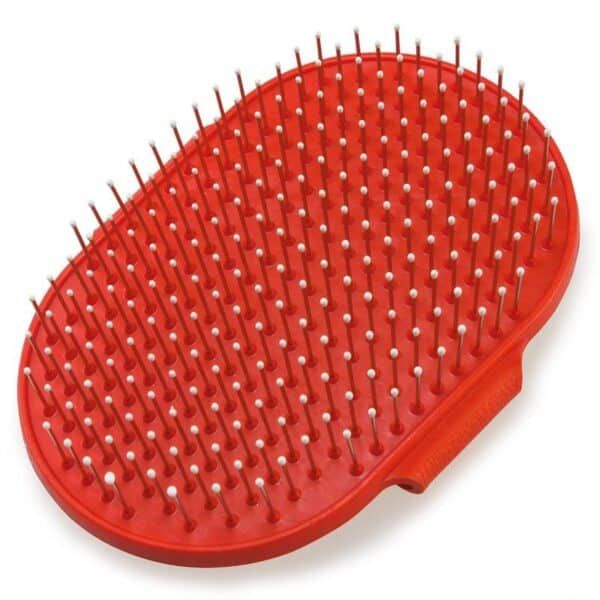 Cepillo para mascotas con púas suaves y base antideslizante para un cuidado fácil y efectivo.