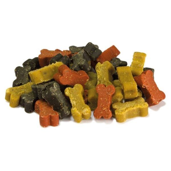 Coloridas gomitas en forma de hueso para perros, sabor variado y textura suave.