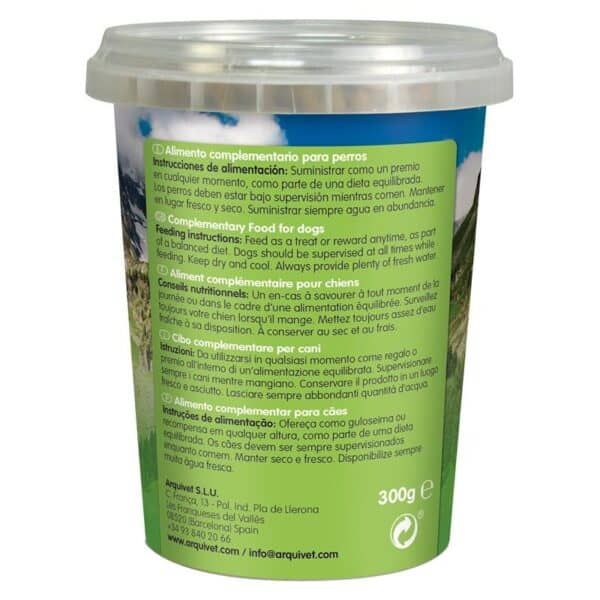 Gominola para perros en envase verde con instrucciones multilingües que recomienda supervisión y conservación adecuada.