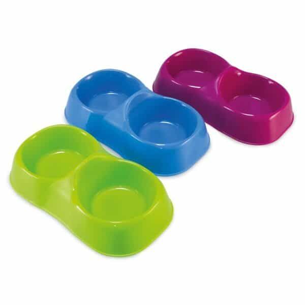 Colorful plastic pet bowls in blue, pink, and green for feeding cats and dogs.