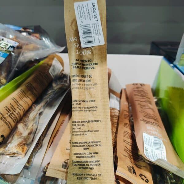 Arnés para perros, alimento complementario para mascotas, snacks para perros, premios caninos, productos para perros.