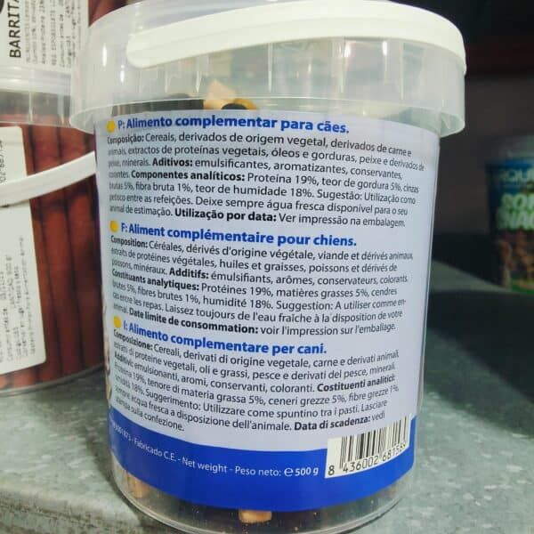 Alimento complementario para perros en envase de 500 g con ingredientes naturales y proteínas de alta calidad.
