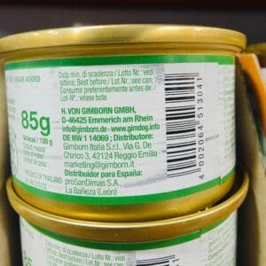 Etiqueta de lata de alimento para mascotas con información y marca Gimborn en alemán y español.