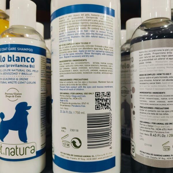 Bote de champú blanco con etiqueta azul y descripción en español, tienda TodoMASKOTAS.