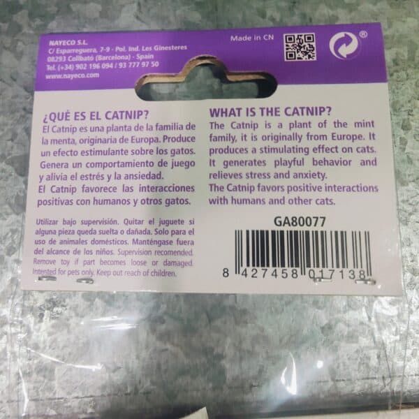 Catnip plant toy for cats, with informative label in Spanish and English.