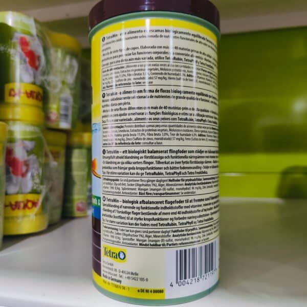 TetraMin - alimento para peces en escamas de alta calidad, balanceado y nutritivo para acuario Filtrando la salud de tus peces.
