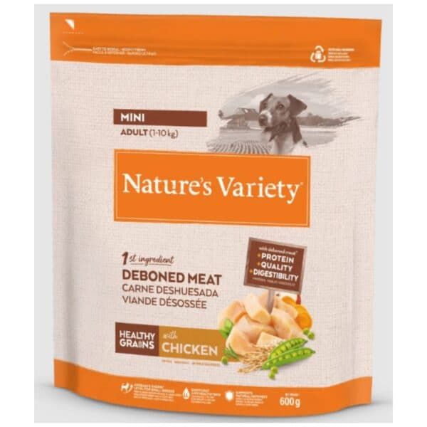 Carne desmenuzada para perros, comida saludable para mascotas, avalada por veterinarios, imagen de alimento canino natural, relevancia para tienda de mascotas.