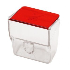 Vaso dispensador de caramelos transparente con tapa roja.