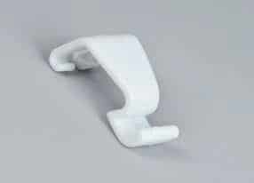 Ganchos de pared para colgar juguetes y artículos decorativos en color blanco.