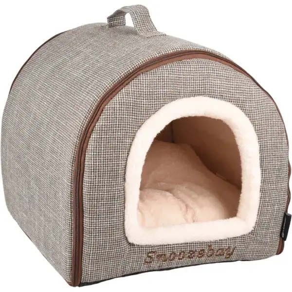 Cueva para mascotas con interior de felpa y diseño compacto, ideal para gatos y perros pequeños.