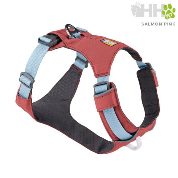Arnés para perros color salmón y azul, ajustable y cómodo, ideal para mascotas activas.