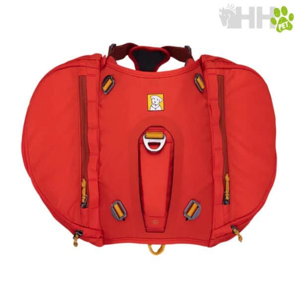 Maleta de transporte para mascotas roja con compartimentos y hebillas, ideal para viajes seguros con perros y gatos.