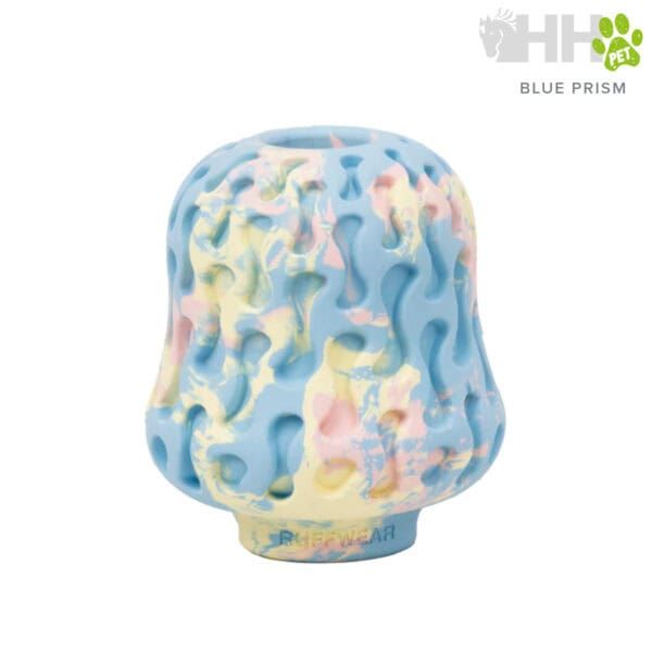 Colorido mordedor de silicona para mascotas en tonos pastel azul, rosa y amarillo.