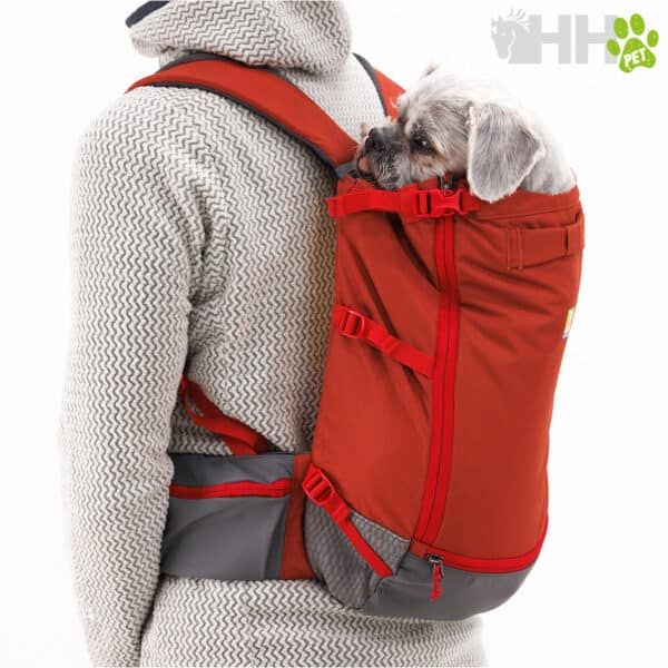 Bolso porta mascotas en mochila roja para perros y gatos.