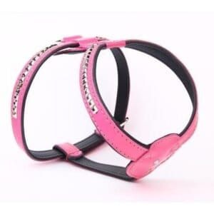 Correa para perros de piel con detalles metálicos y clavos en color rosa, 60 cm.