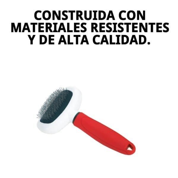 Cepillo metálico ovalado para mascotas, ideal para perros y gatos pequeños, fácil de usar y resistente.